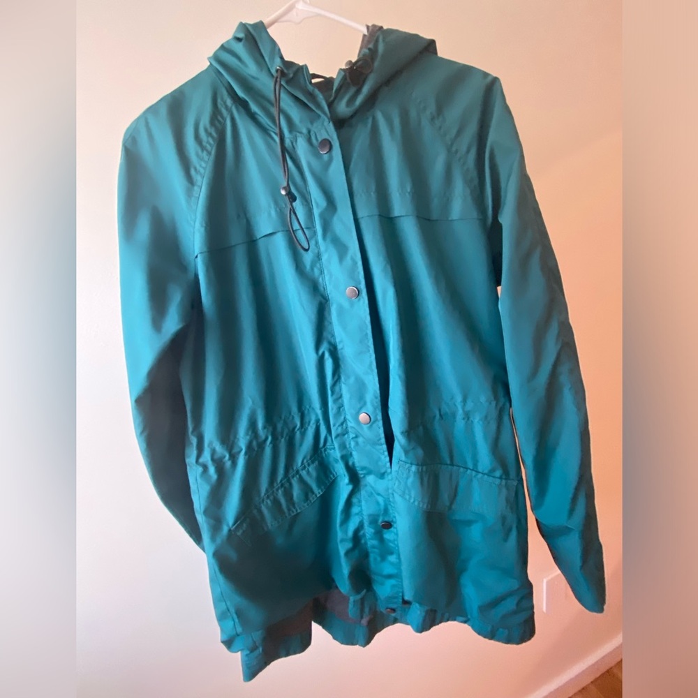 Teal blue / green women’s windbreaker raincoat with hood